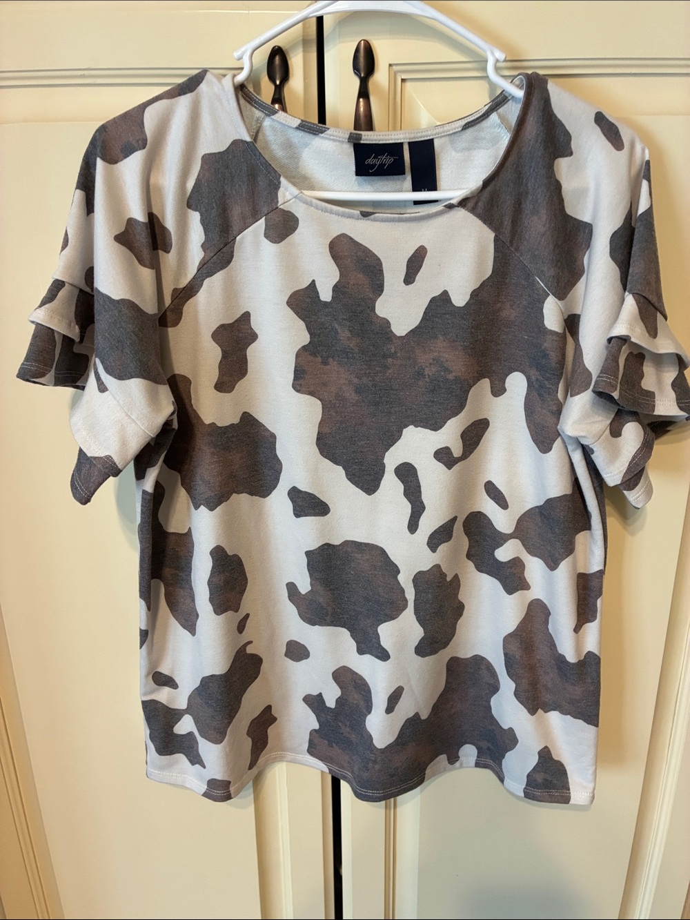 DAYTRIP Cow Print Top
